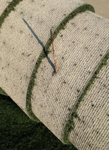spikes in used artificial turf