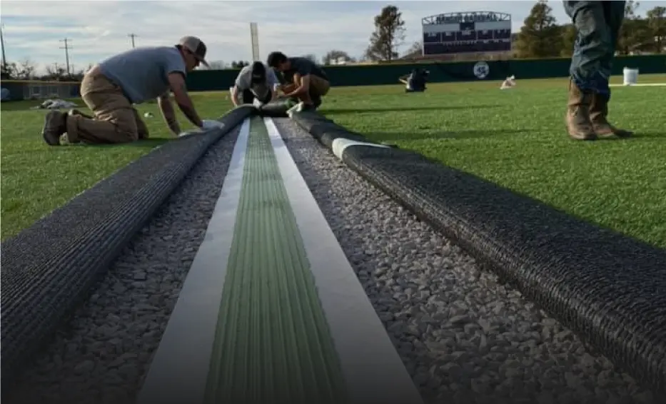 applying glue for artificial turf