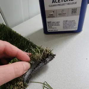 Removing glue from Artificial Grass
