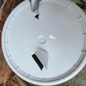 add an air hole to bucket